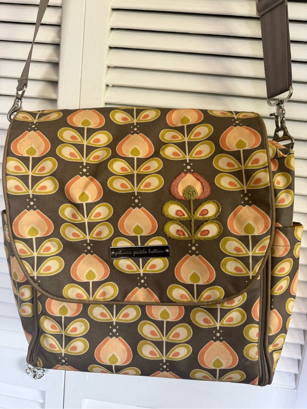 Petunia Pickle Bottom Brown Crossbody Bag with Peach and Olive Floral Print